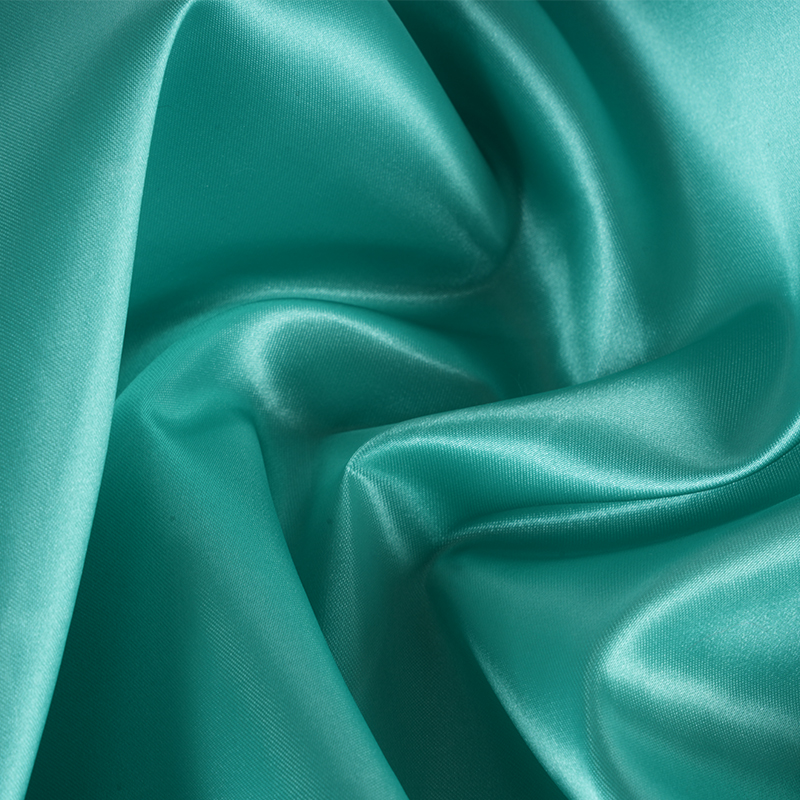 50/75 光沢のある無撚サテン + 薄いパドルオントップ生地